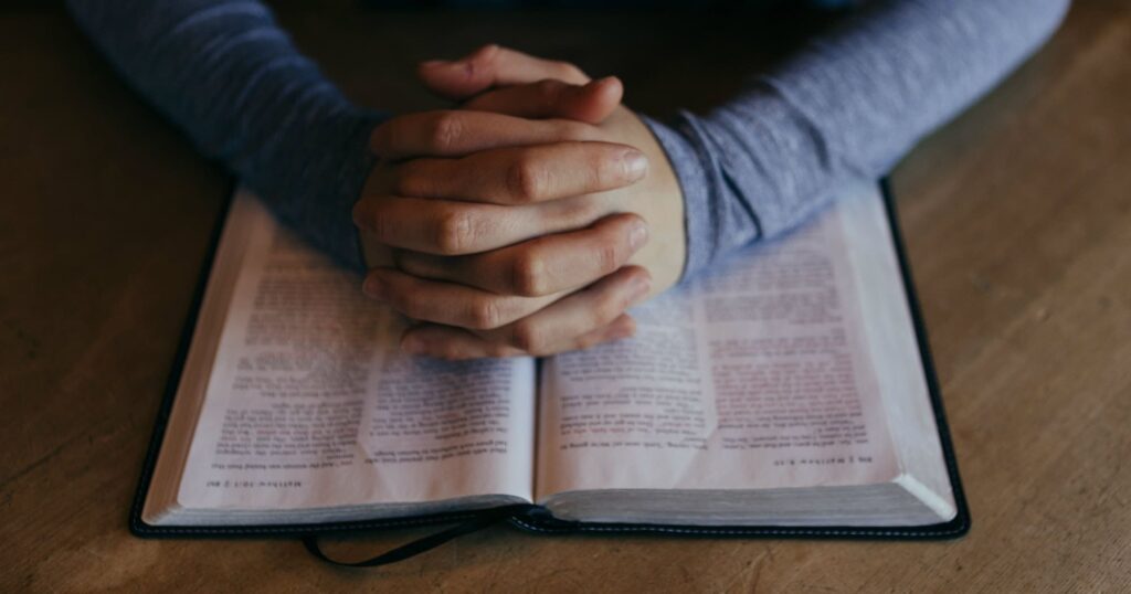Prayer-over-Bible The Astute Berean